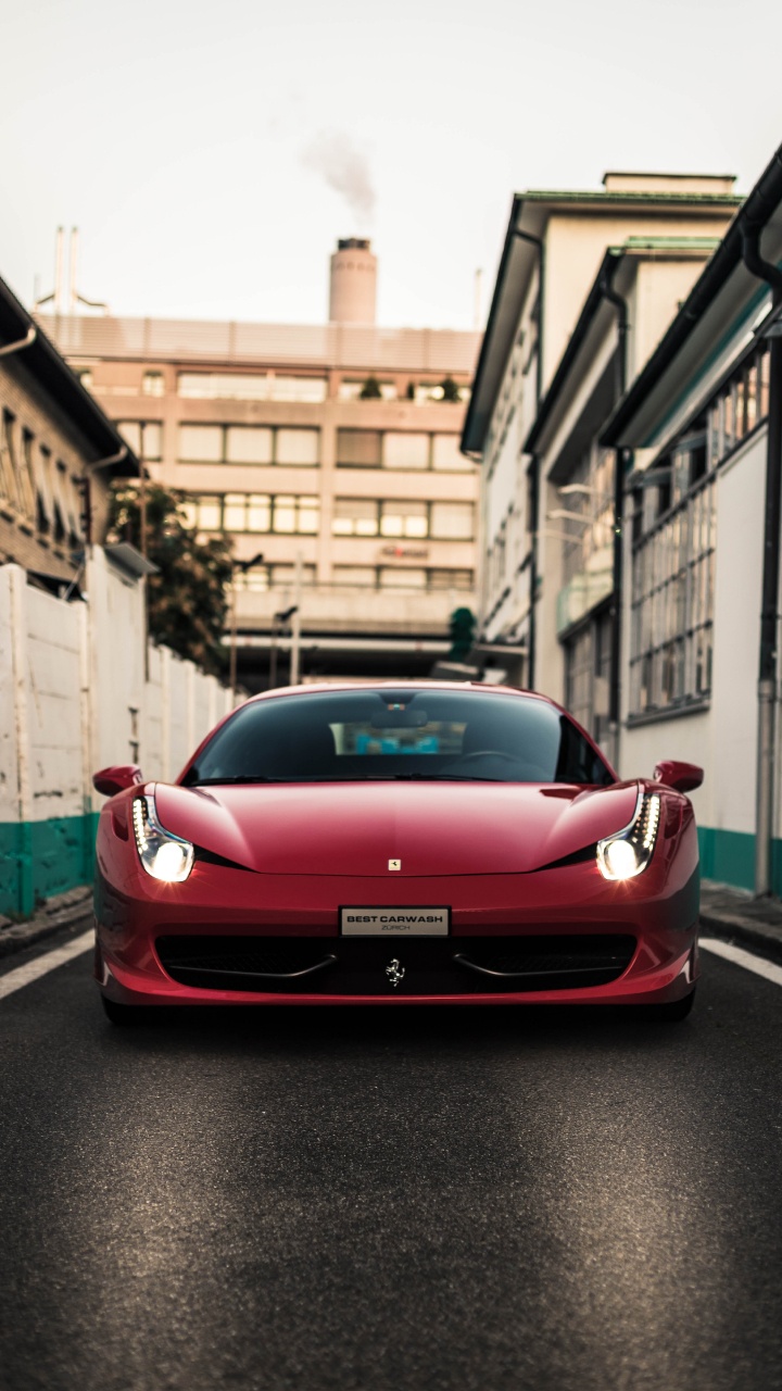 Red Ferrari 458 Italia Parked on Sidewalk During Daytime. Wallpaper in 720x1280 Resolution