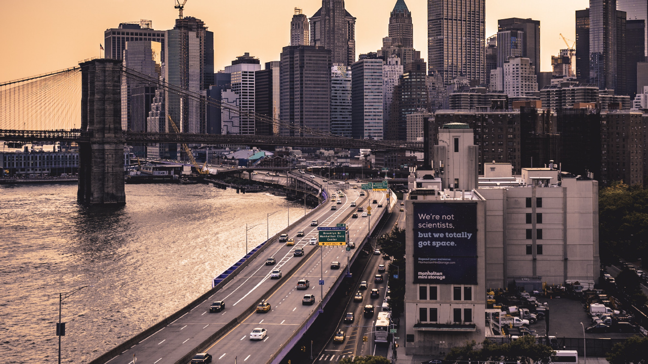 City Skyline Near Body of Water During Daytime. Wallpaper in 1280x720 Resolution