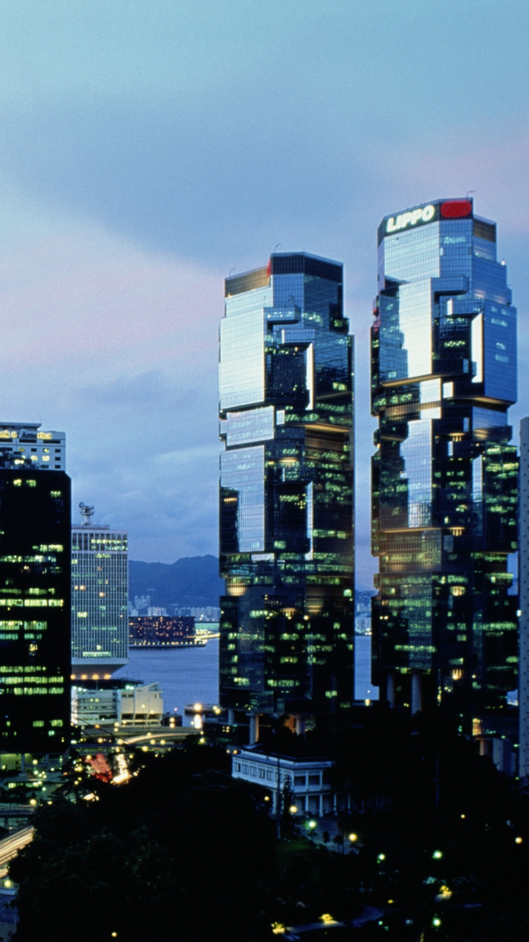 City Buildings Under Gray Sky During Night Time. Wallpaper in 1080x1920 Resolution