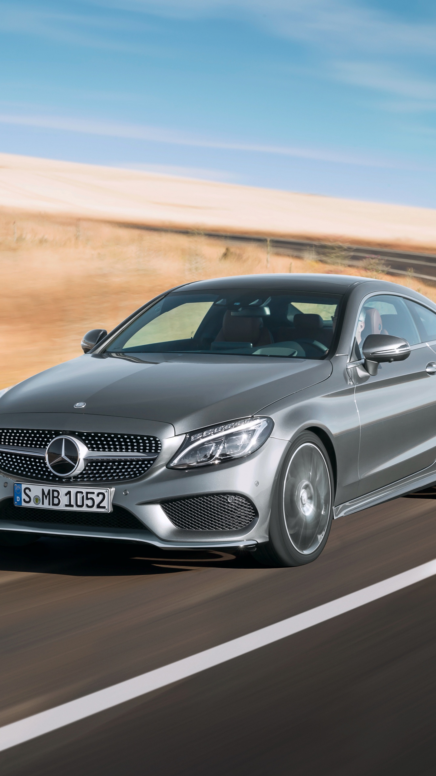 Black Mercedes Benz Coupe on Road During Daytime. Wallpaper in 1440x2560 Resolution