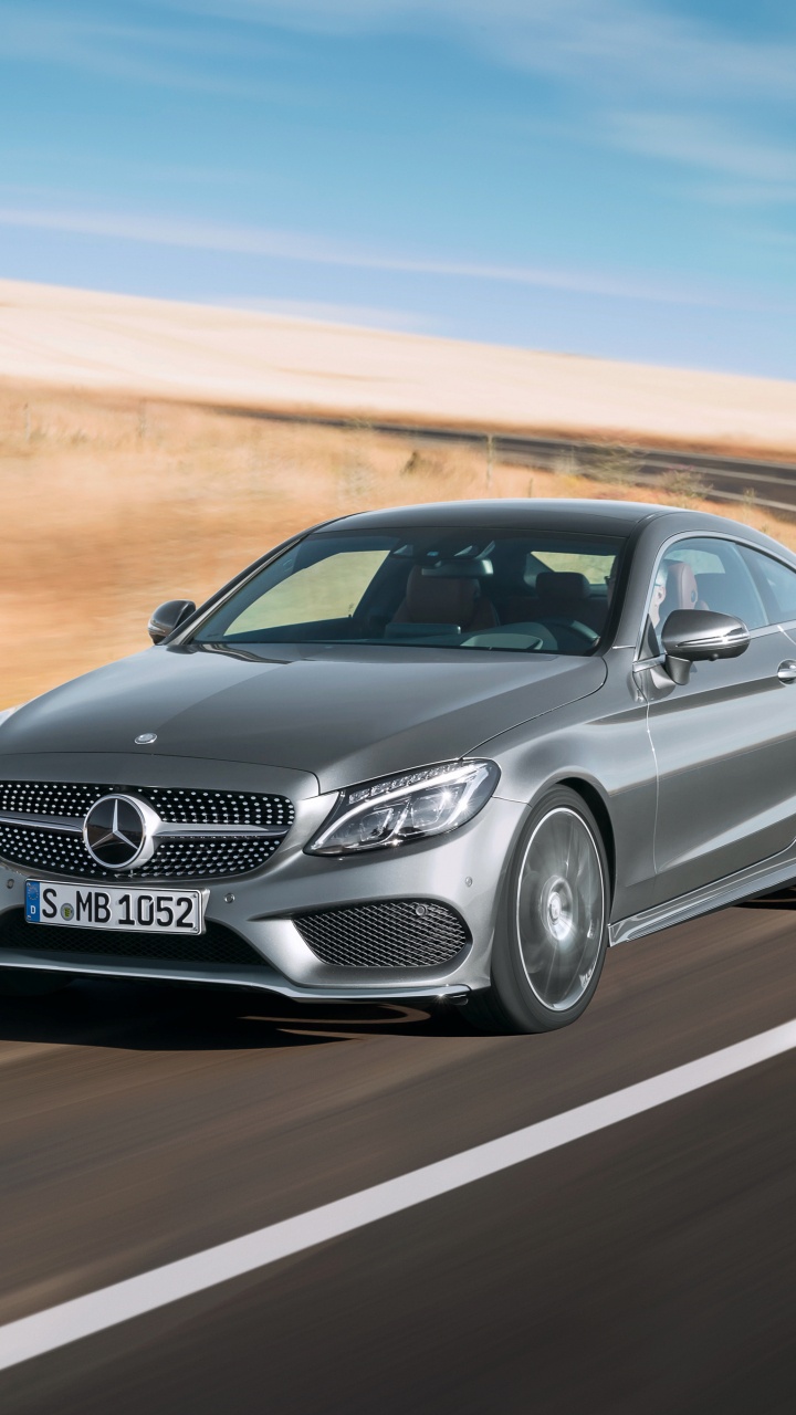 Black Mercedes Benz Coupe on Road During Daytime. Wallpaper in 720x1280 Resolution