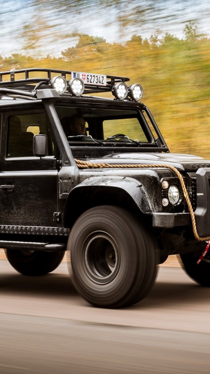 Black and White Jeep Wrangler on Road During Daytime. Wallpaper in 720x1280 Resolution