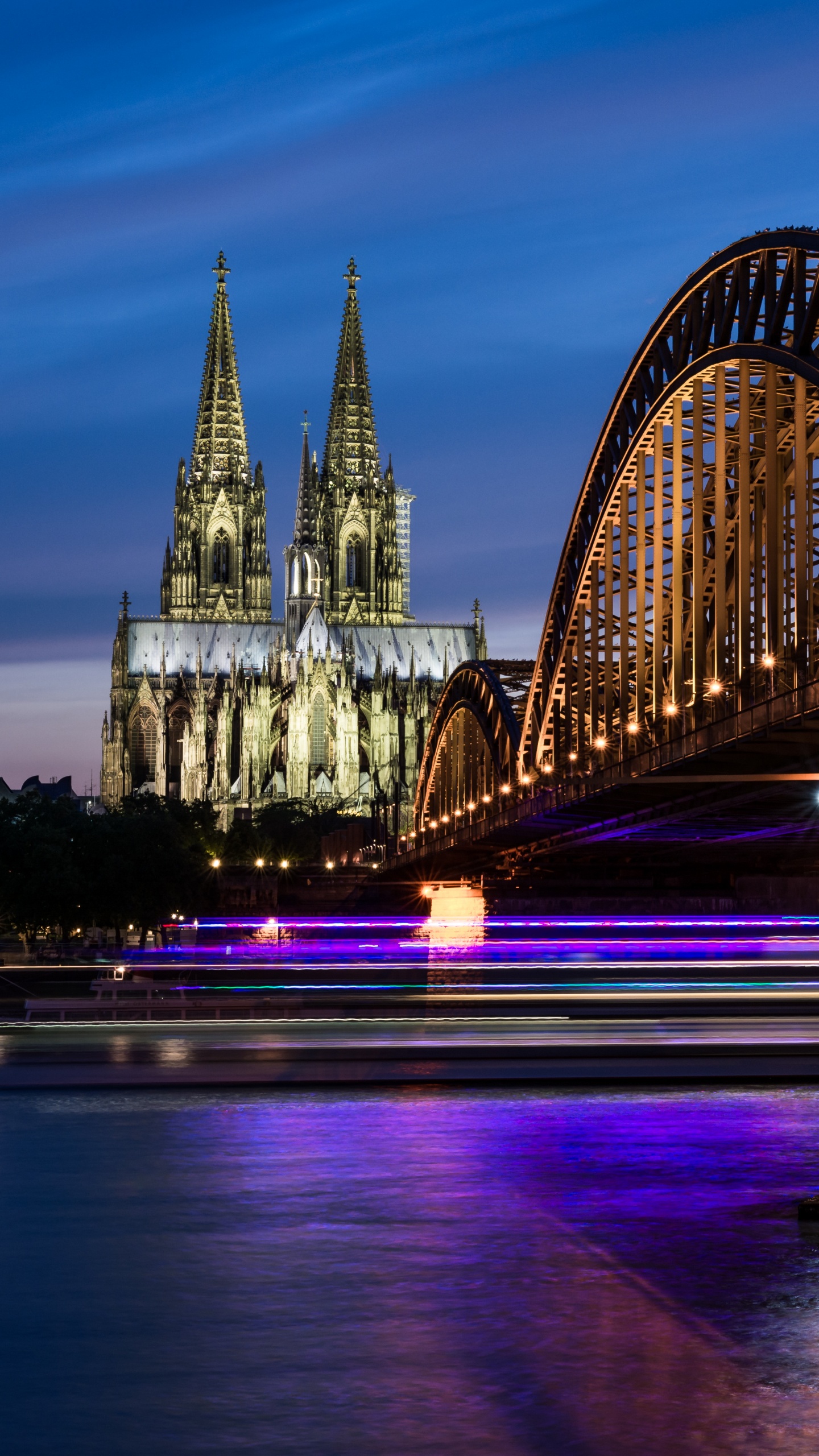 Bridge Over Body of Water During Night Time. Wallpaper in 1440x2560 Resolution
