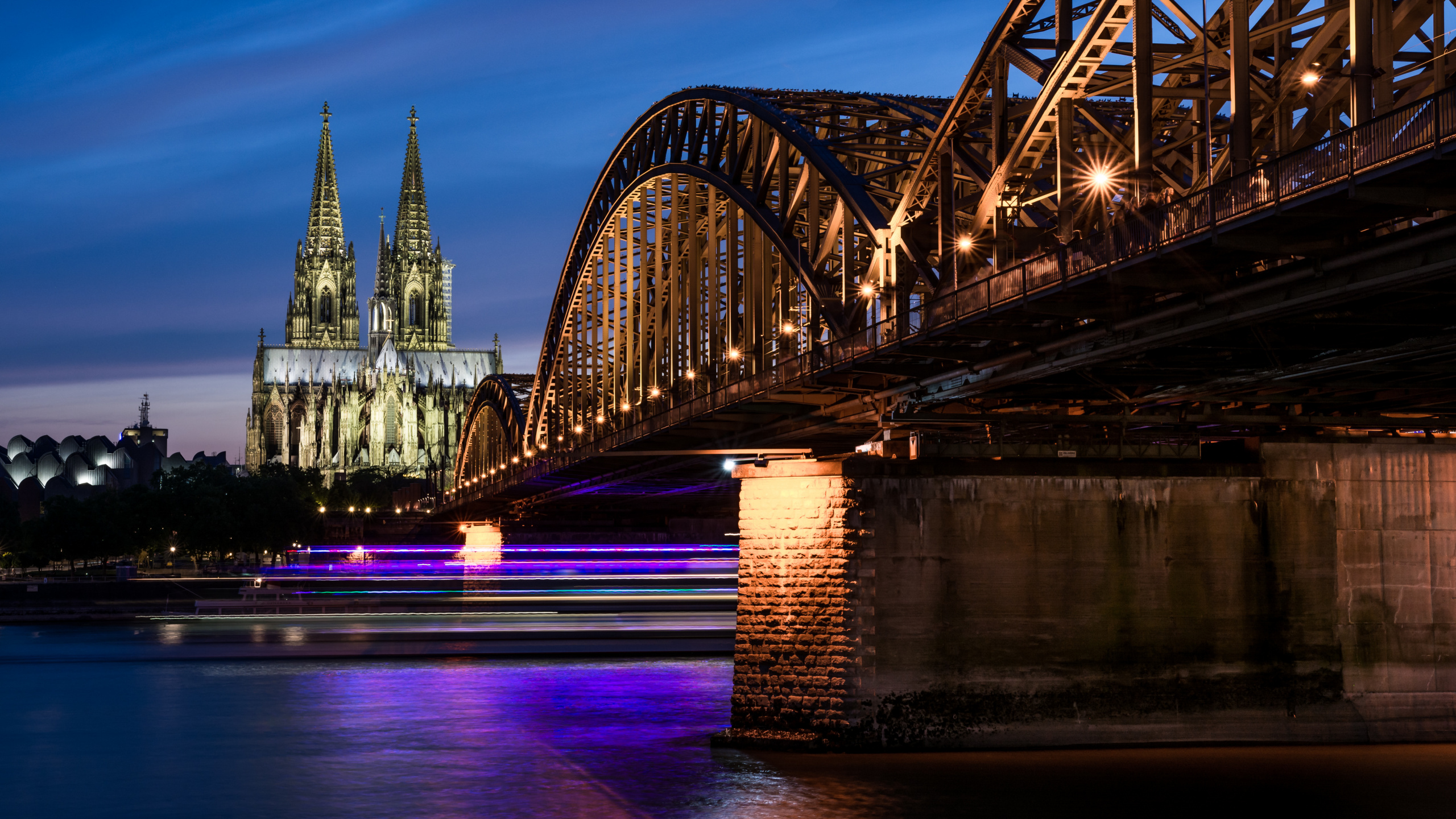 Bridge Over Body of Water During Night Time. Wallpaper in 2560x1440 Resolution