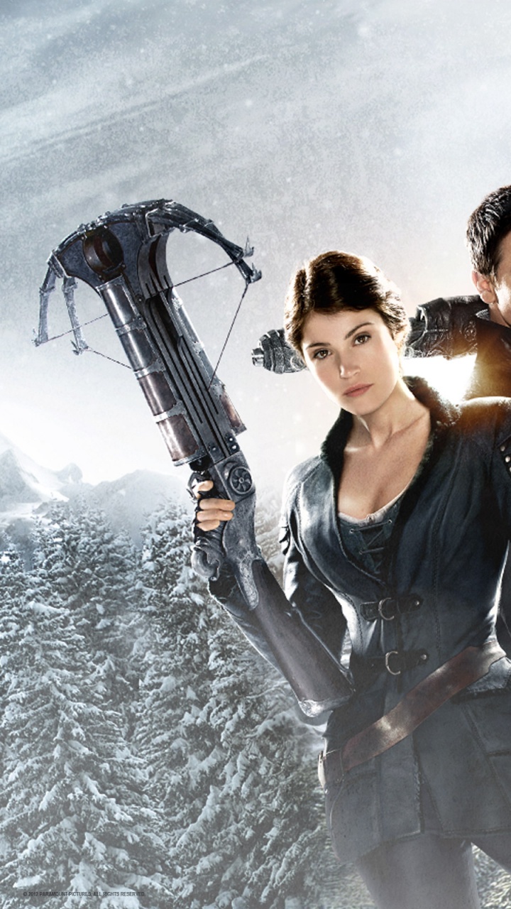 Man and Woman in Black and White Coat Standing on Snow Covered Ground During Daytime. Wallpaper in 720x1280 Resolution