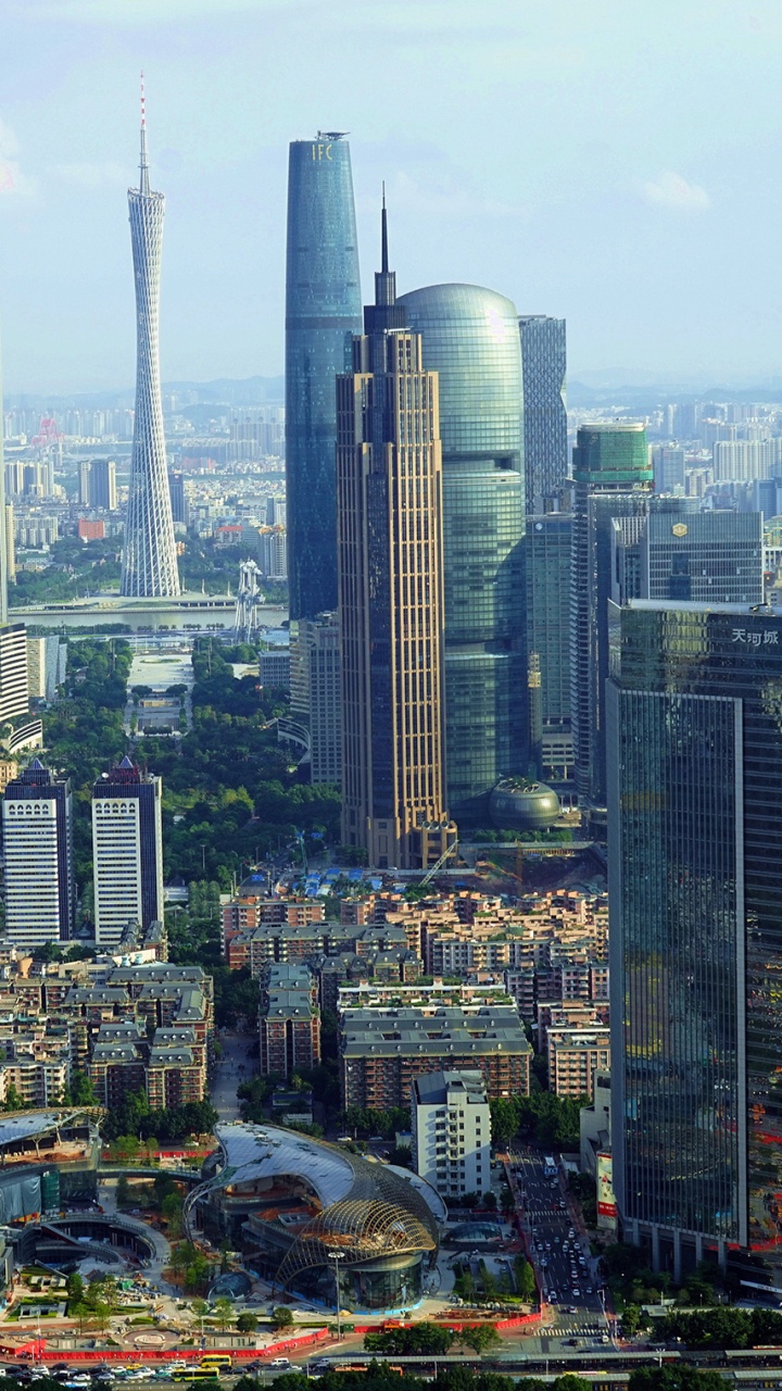 City Skyline Under White Sky During Daytime. Wallpaper in 720x1280 Resolution