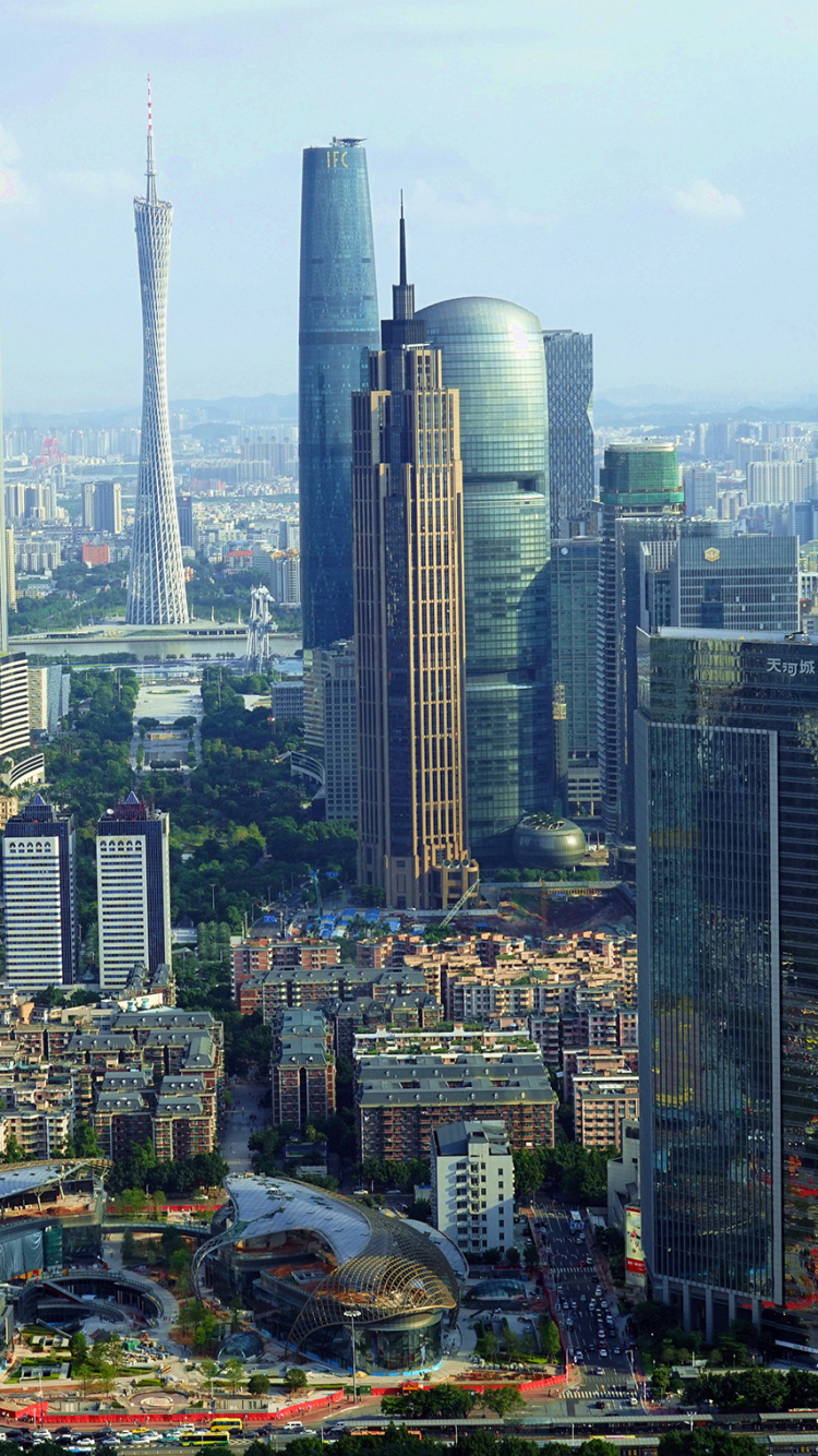 City Skyline Under White Sky During Daytime. Wallpaper in 750x1334 Resolution