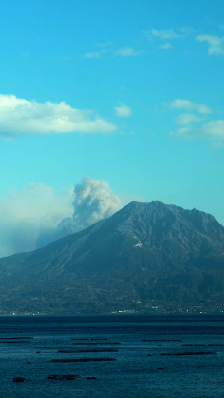 Mountain Range Under Blue Sky During Daytime. Wallpaper in 720x1280 Resolution