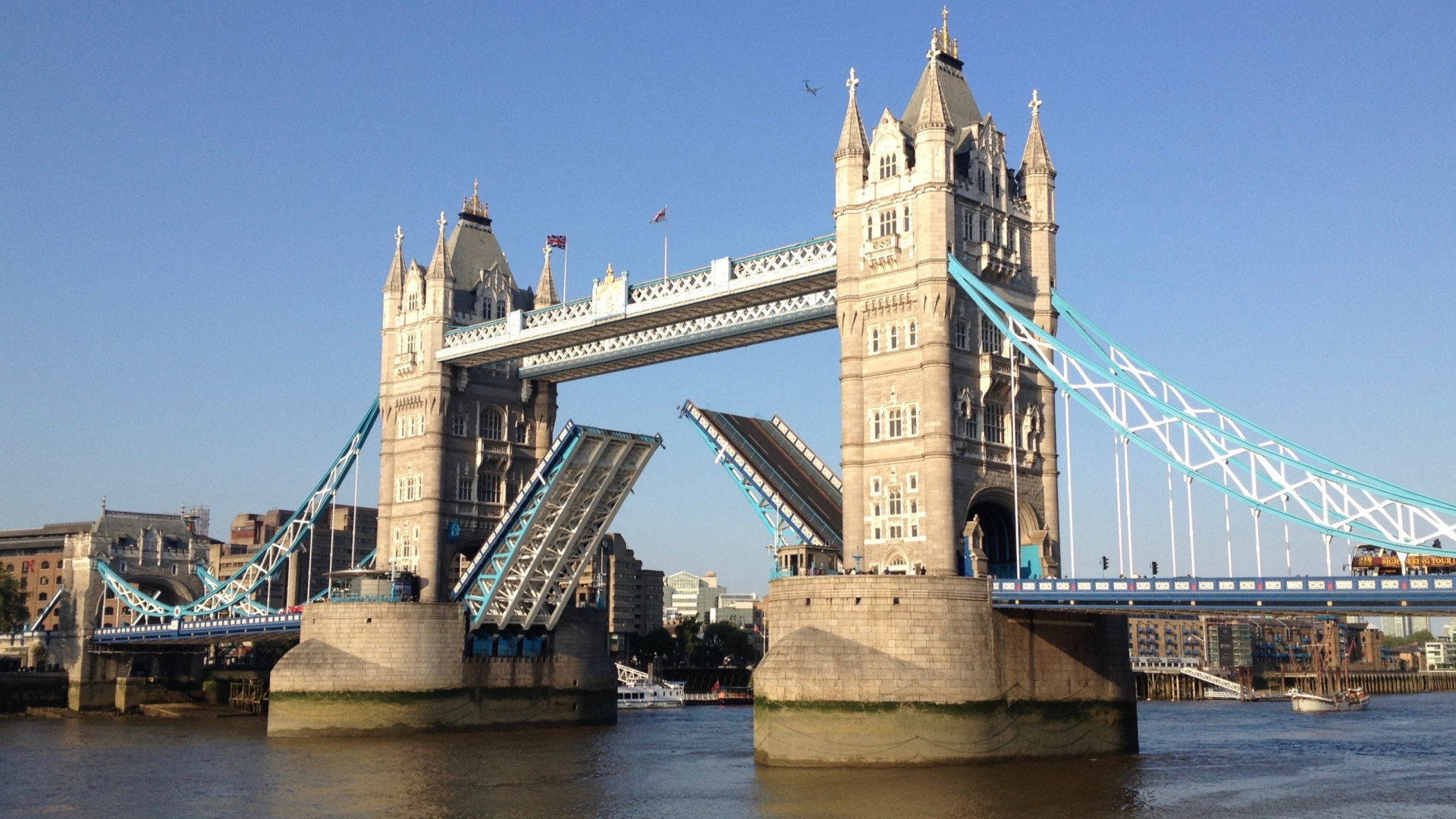 Brown Concrete Bridge Under Blue Sky During Daytime. Wallpaper in 1920x1080 Resolution