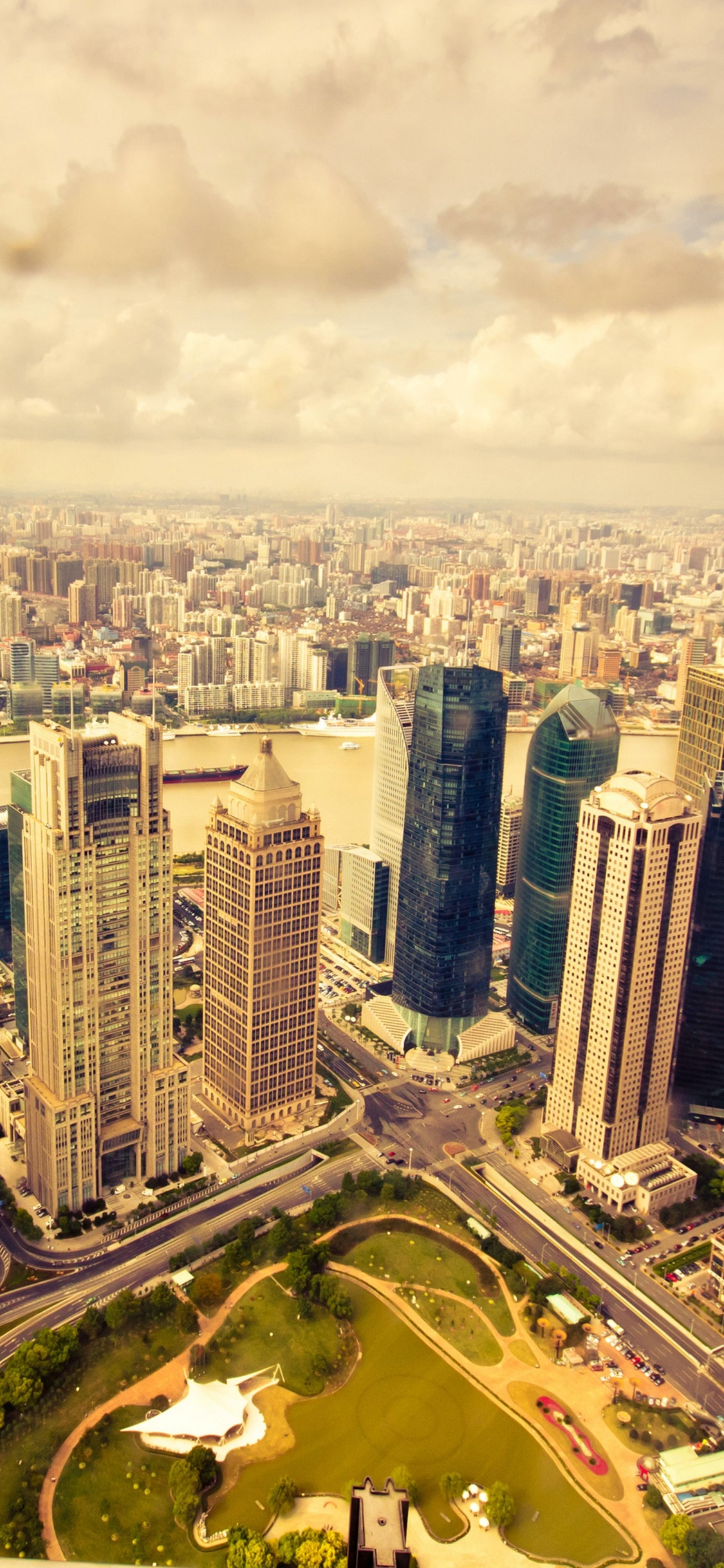 Aerial View of City Buildings During Daytime. Wallpaper in 1125x2436 Resolution