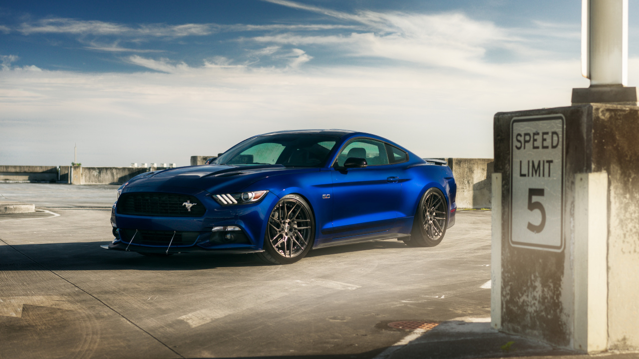 Blue Bmw m 3 Coupe Parked on Gray Concrete Pavement Under White Clouds During Daytime. Wallpaper in 1280x720 Resolution