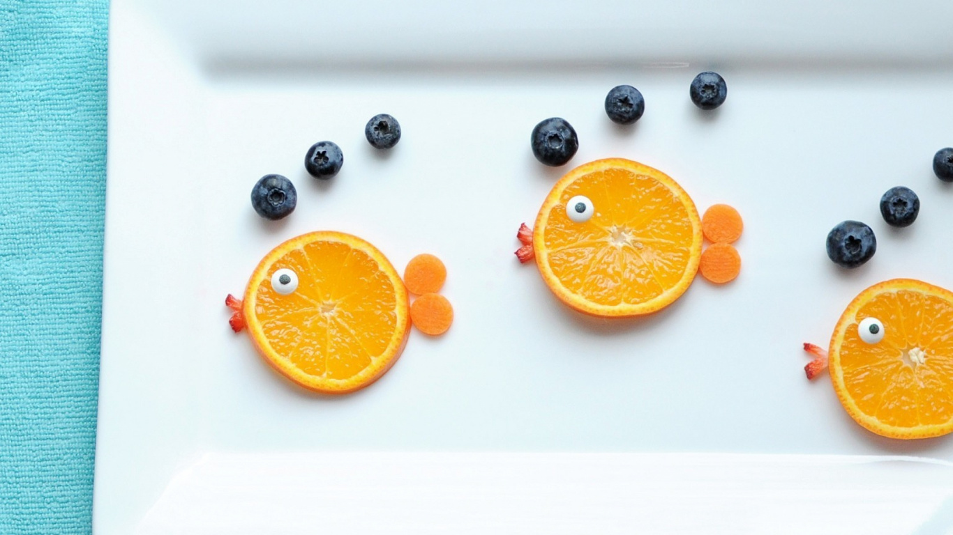 Sliced Orange Fruit on White Ceramic Plate. Wallpaper in 1366x768 Resolution