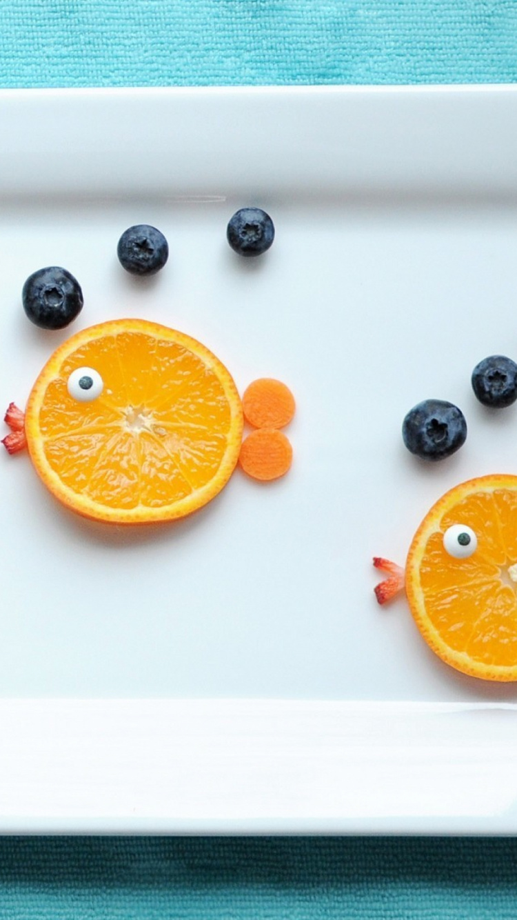 Sliced Orange Fruit on White Ceramic Plate. Wallpaper in 750x1334 Resolution