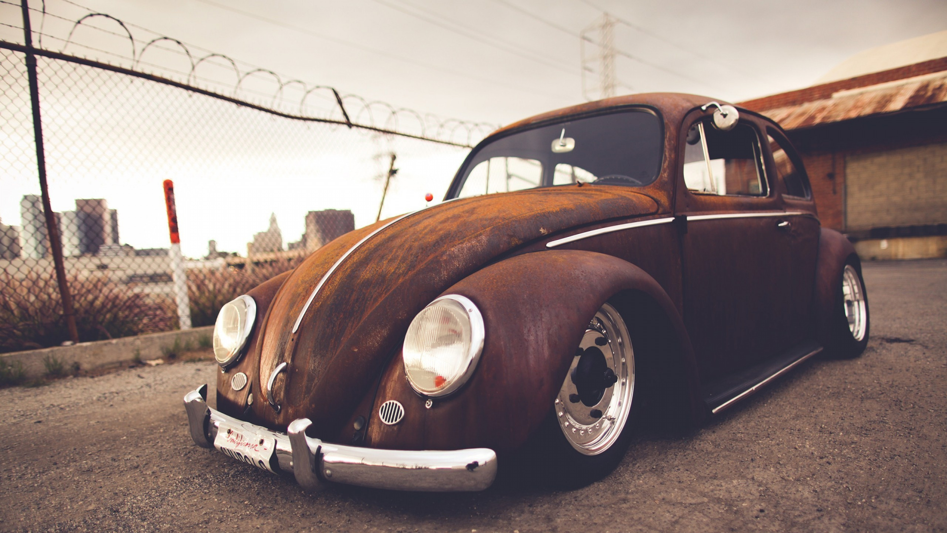 Brown Vintage Car on Gray Concrete Ground. Wallpaper in 1920x1080 Resolution