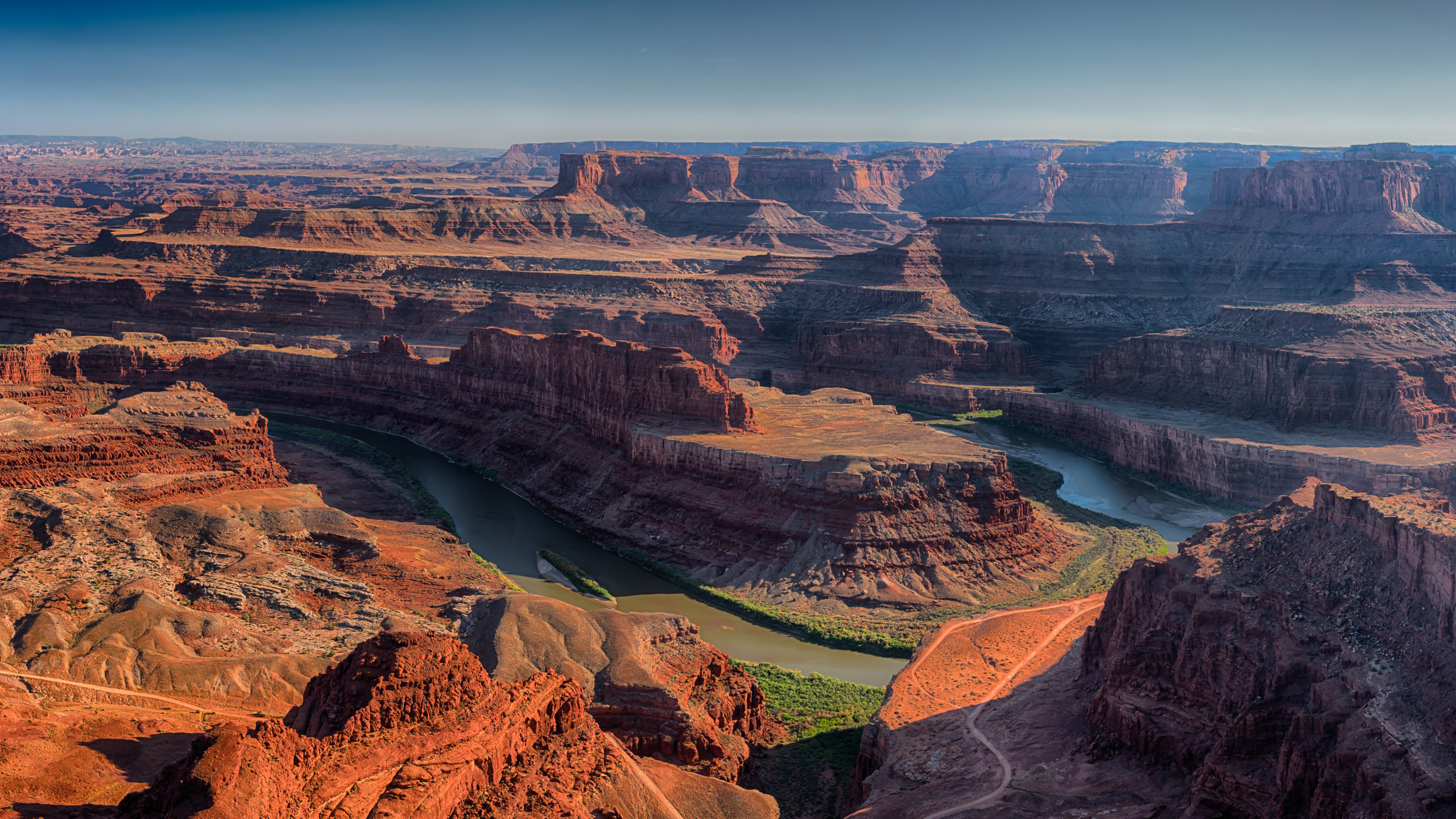 Aerial View of Brown and Green Mountains and Green Grass Field. Wallpaper in 2560x1440 Resolution