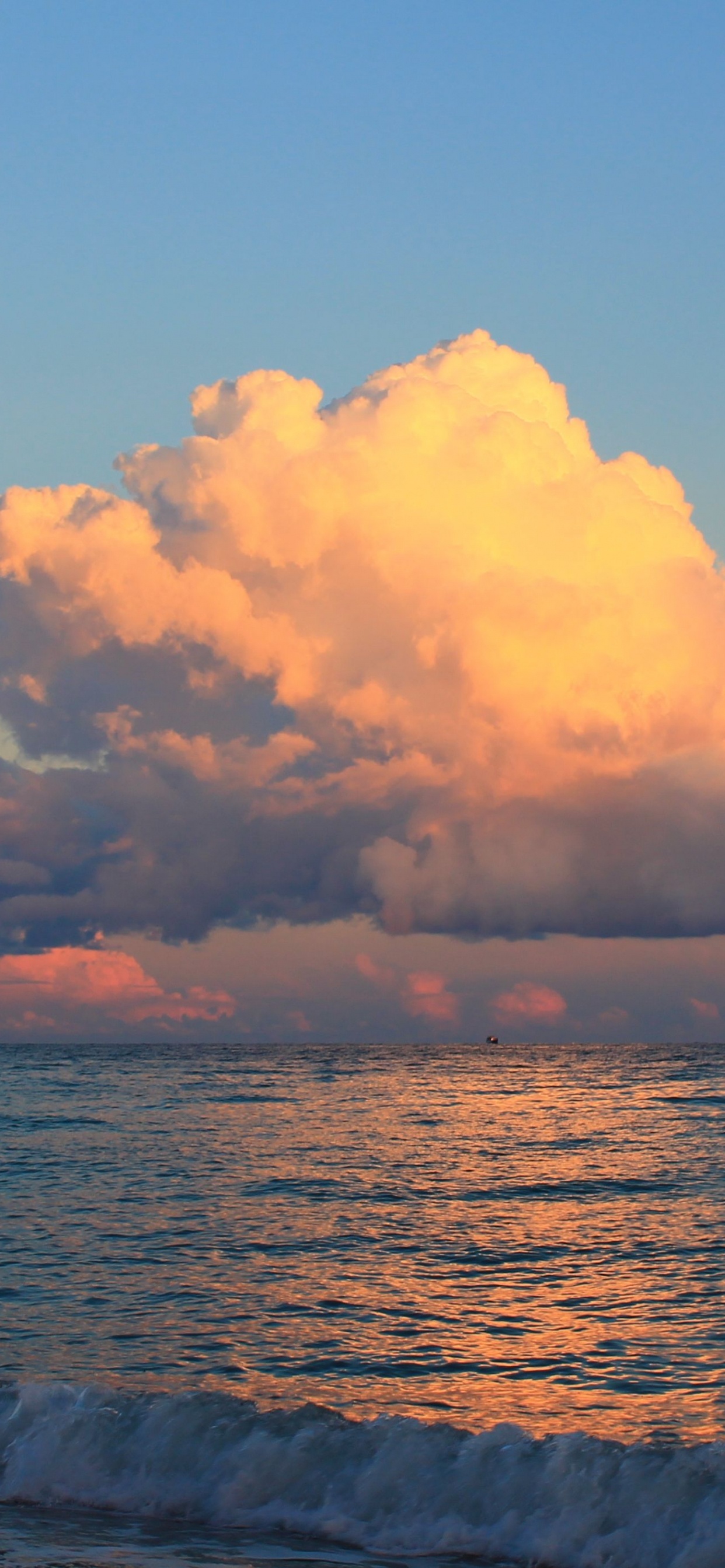 Sea Waves Crashing on Shore During Sunset. Wallpaper in 1242x2688 Resolution