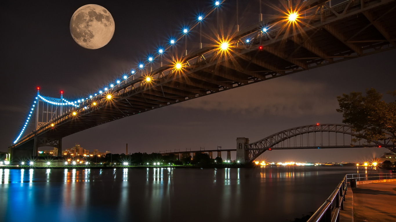 Bridge Over Body of Water During Night Time. Wallpaper in 1366x768 Resolution
