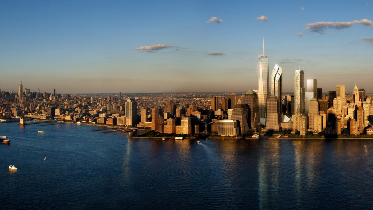 City Skyline Across Body of Water During Daytime. Wallpaper in 1280x720 Resolution