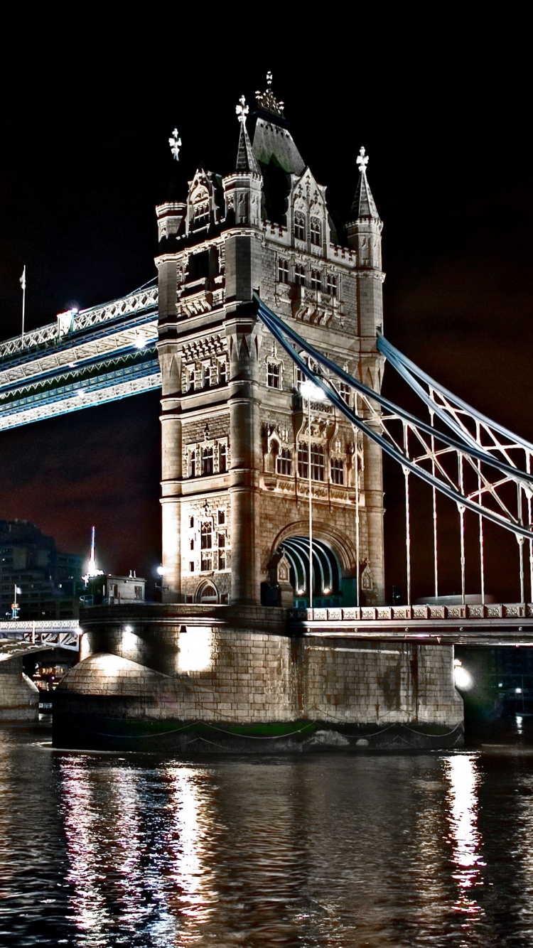 White Bridge Over River During Night Time. Wallpaper in 750x1334 Resolution