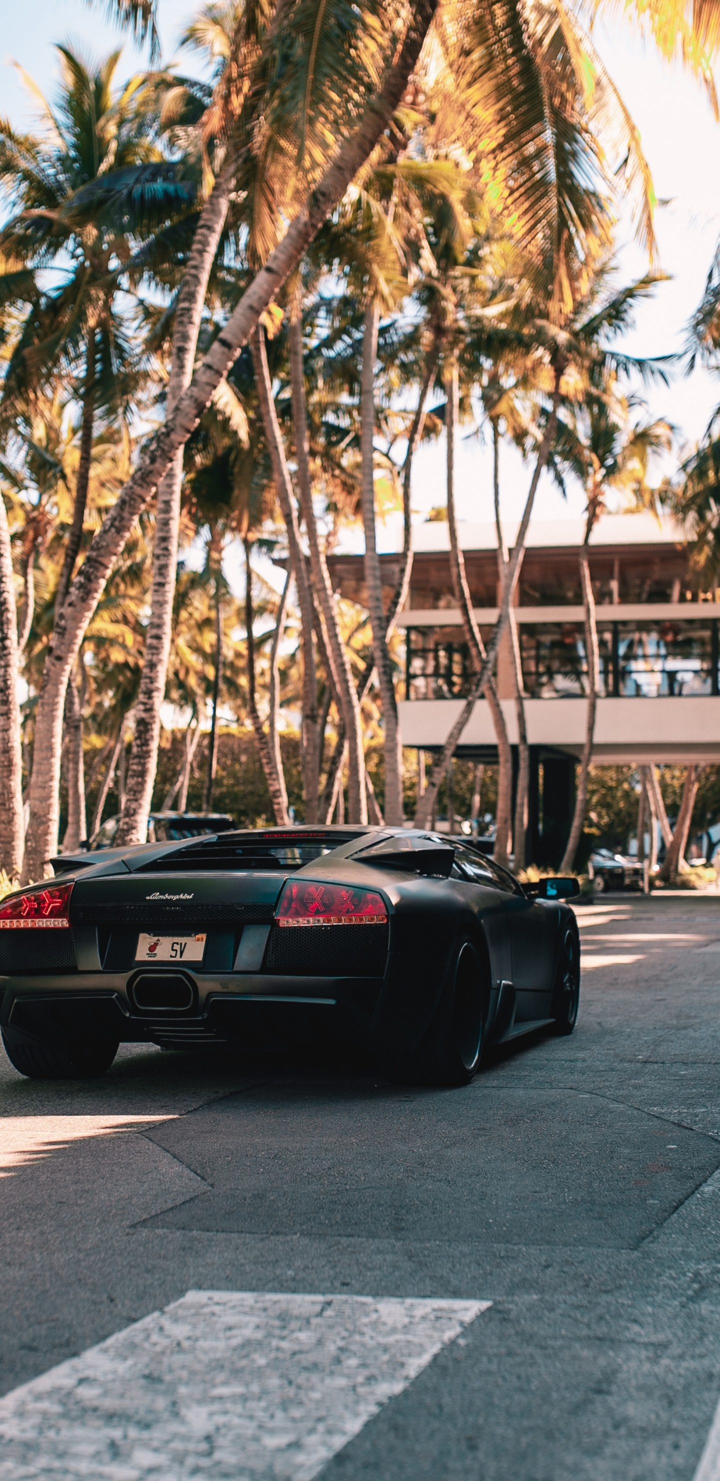 Black Porsche 911 Parked on Road During Daytime. Wallpaper in 1440x2960 Resolution
