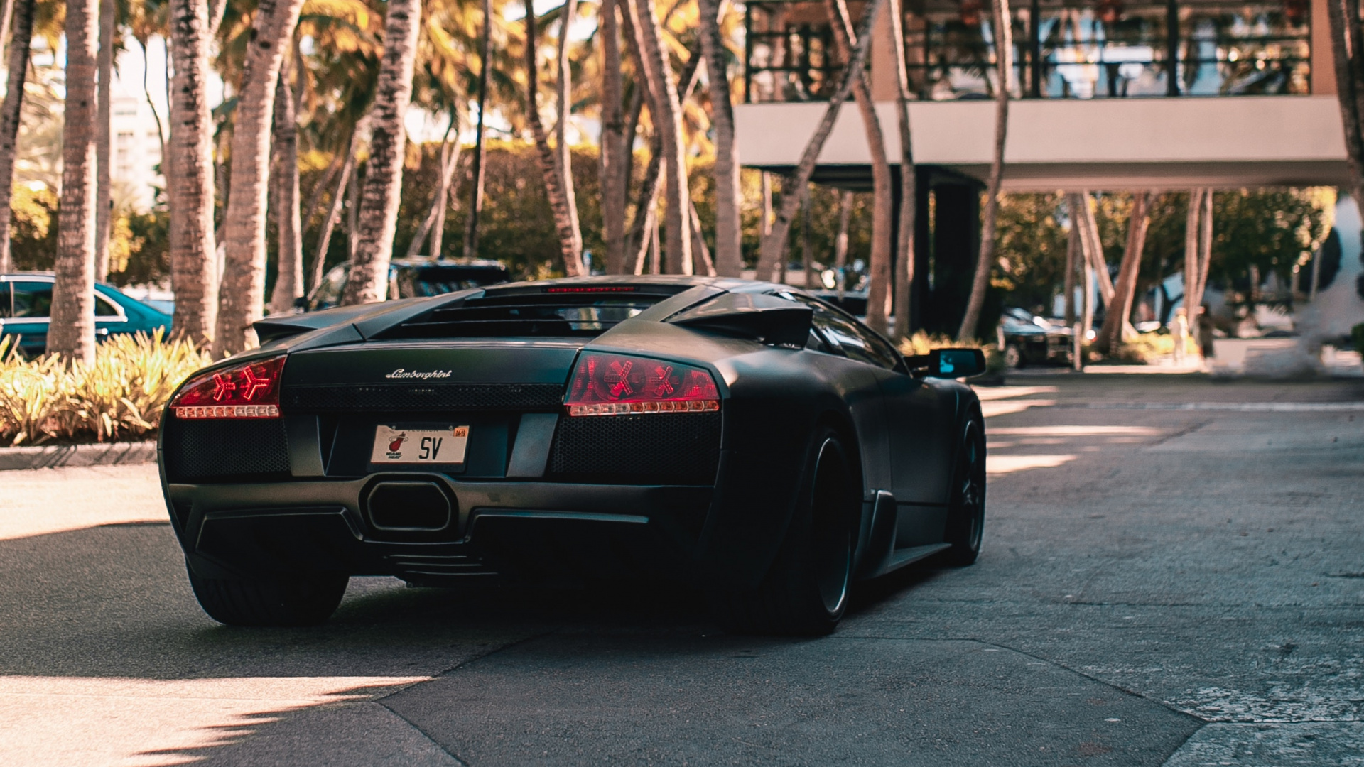 Black Porsche 911 Parked on Road During Daytime. Wallpaper in 1920x1080 Resolution