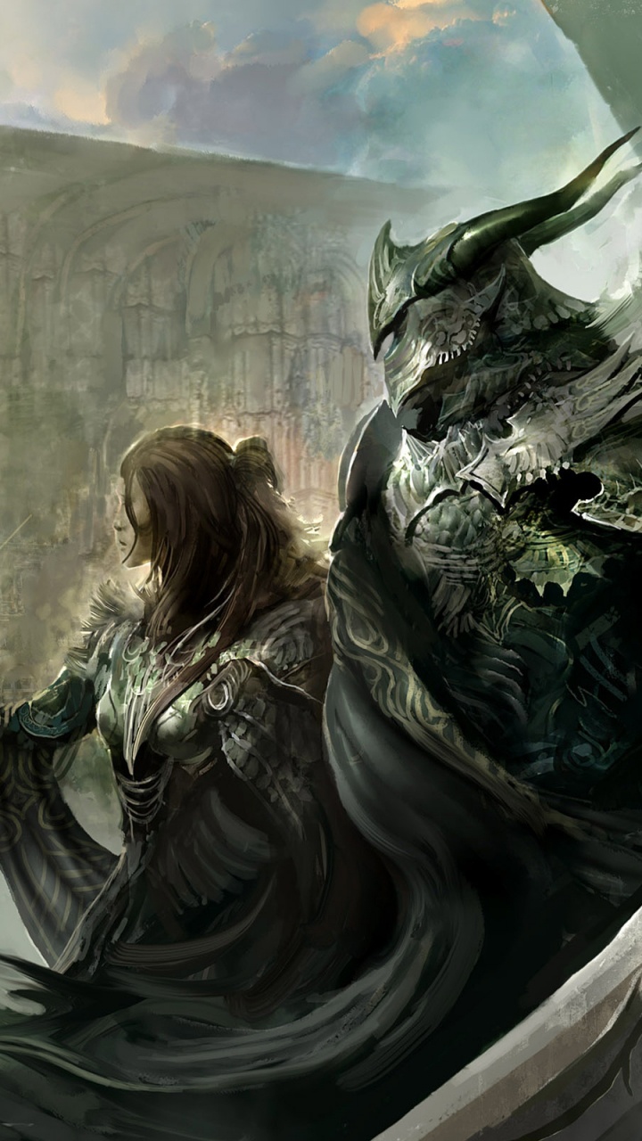 Mujer en Vestido Negro Sentada Sobre Una Roca. Wallpaper in 720x1280 Resolution