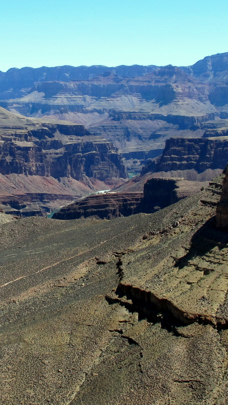 Brown Mountain Range During Daytime. Wallpaper in 750x1334 Resolution