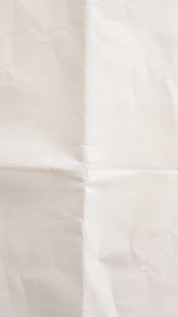 White Printer Paper on Brown Wooden Table. Wallpaper in 720x1280 Resolution