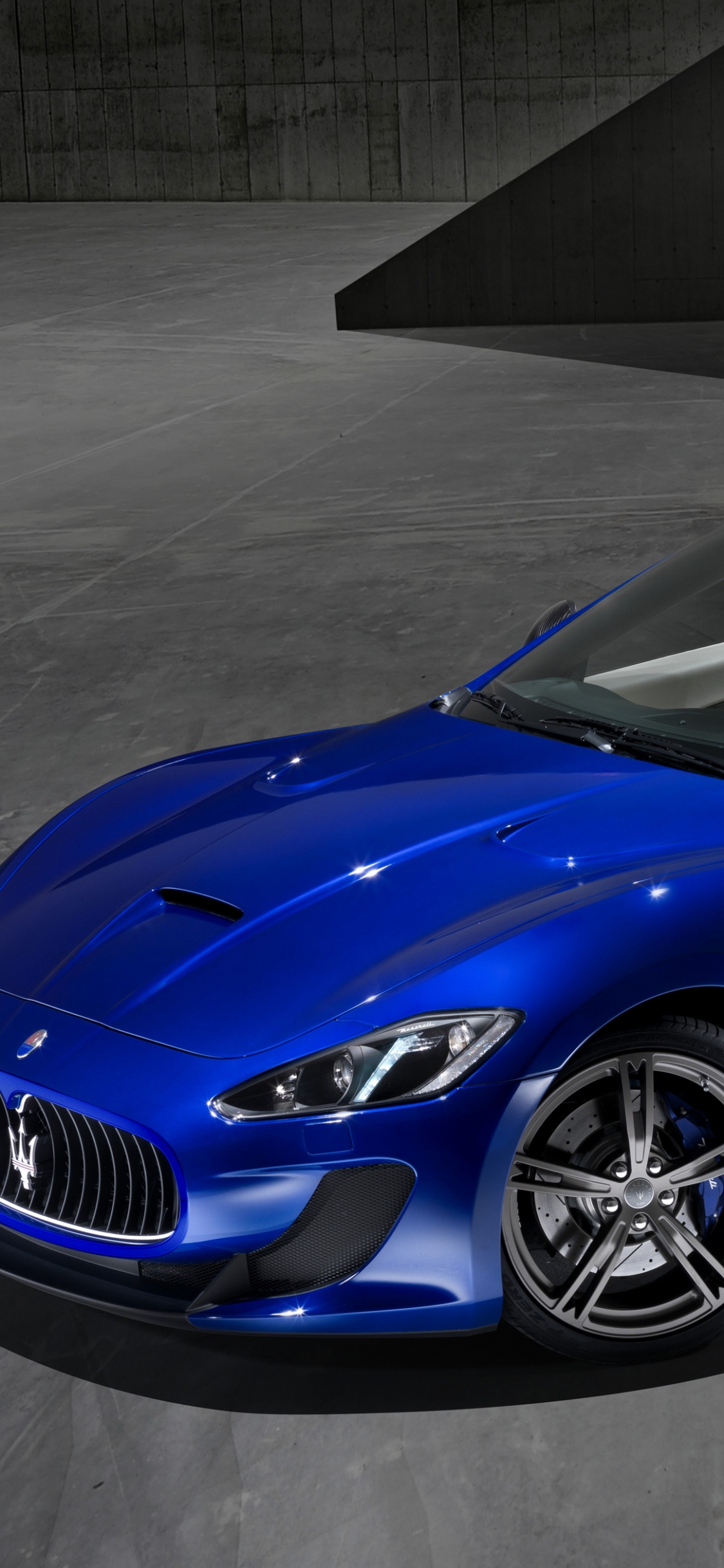 Blue Chevrolet Camaro Convertible Coupe. Wallpaper in 1125x2436 Resolution