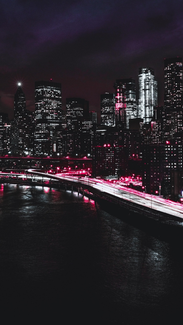 City Skyline During Night Time. Wallpaper in 720x1280 Resolution