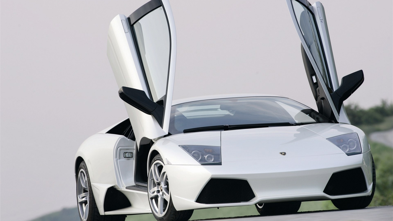 Weißer Porsche 911 Auf Grauem Hintergrund. Wallpaper in 1280x720 Resolution