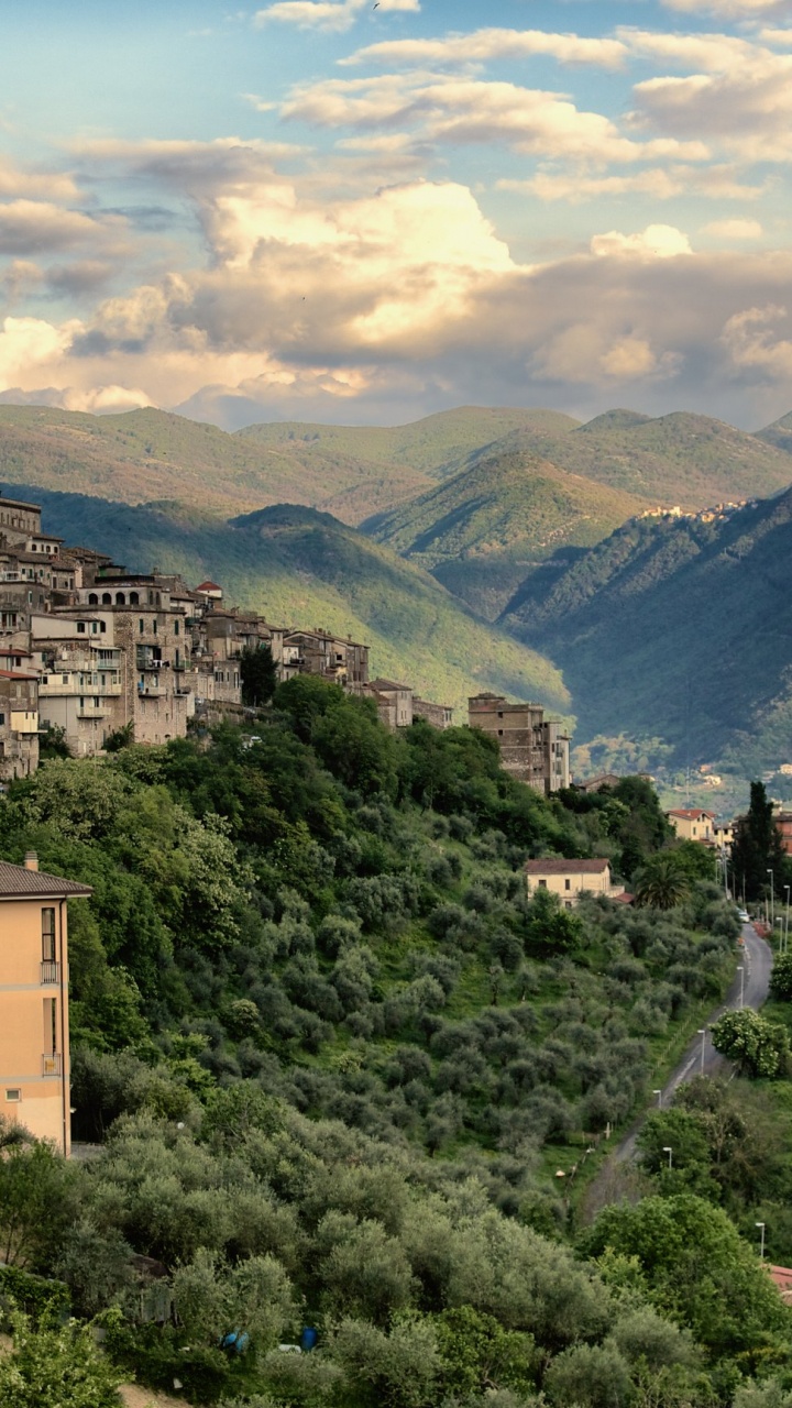 Brown Concrete Building on Top of Mountain During Daytime. Wallpaper in 720x1280 Resolution