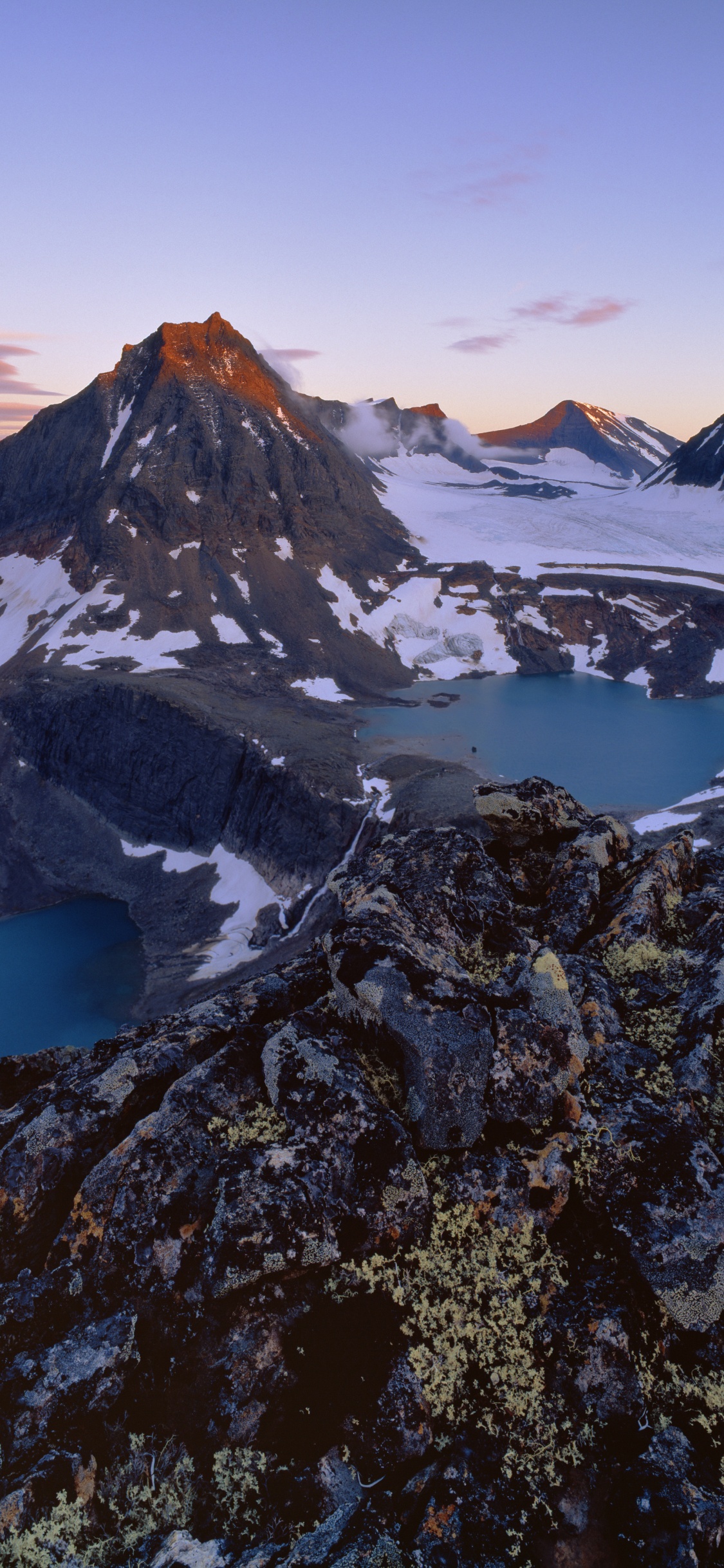 Snow Covered Mountain During Daytime. Wallpaper in 1125x2436 Resolution