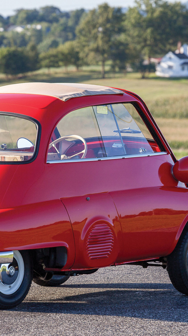 Red Volkswagen Beetle on Road During Daytime. Wallpaper in 750x1334 Resolution