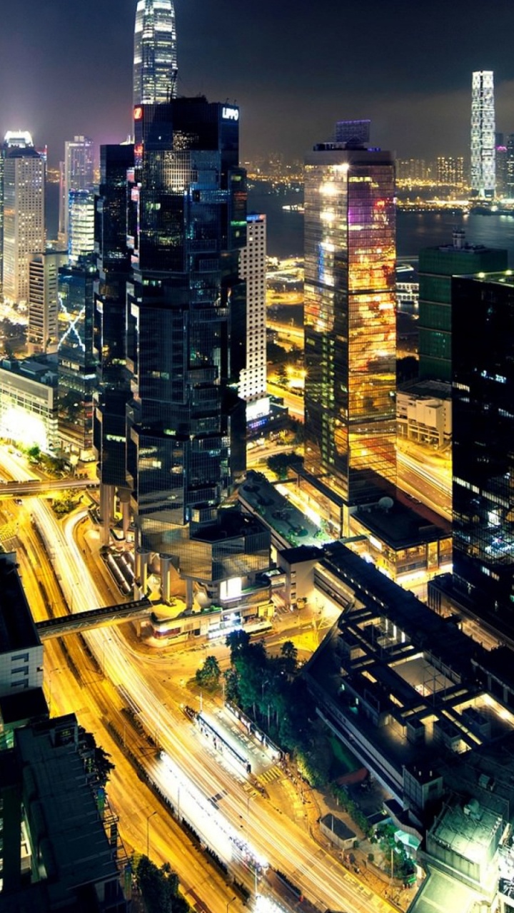 Vue Aérienne Des Bâtiments de la Ville Pendant la Nuit. Wallpaper in 720x1280 Resolution