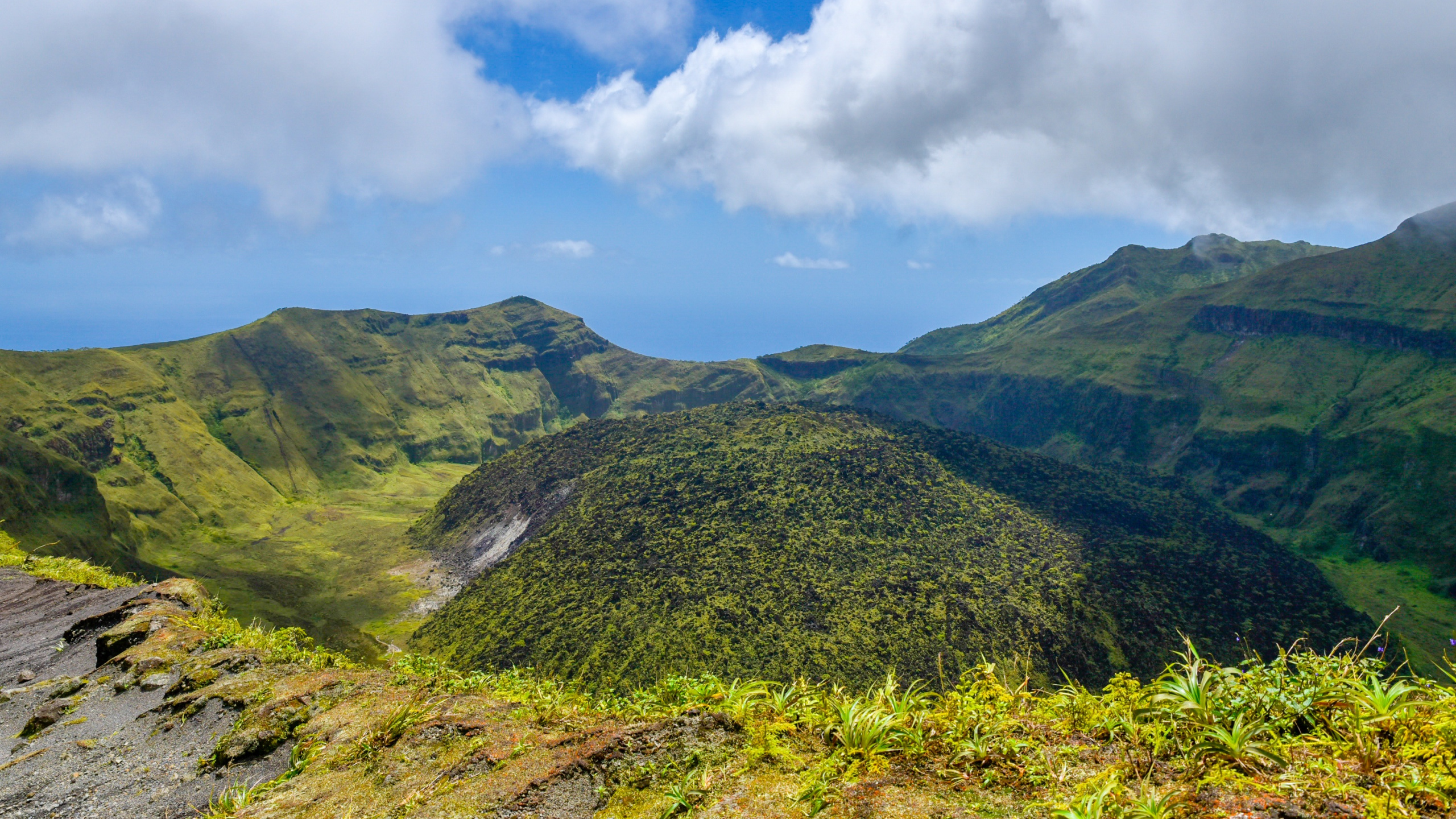 Green Mountain Under Blue Sky and White Clouds During Daytime. Wallpaper in 2560x1440 Resolution