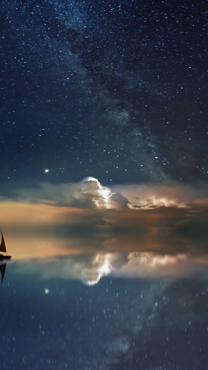 Silhouette of Person Standing on Boat on Water Under Starry Night. Wallpaper in 720x1280 Resolution