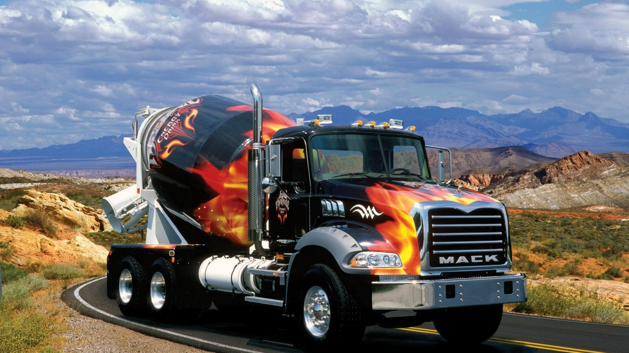 Black and Orange Truck on Road During Daytime. Wallpaper in 1280x720 Resolution