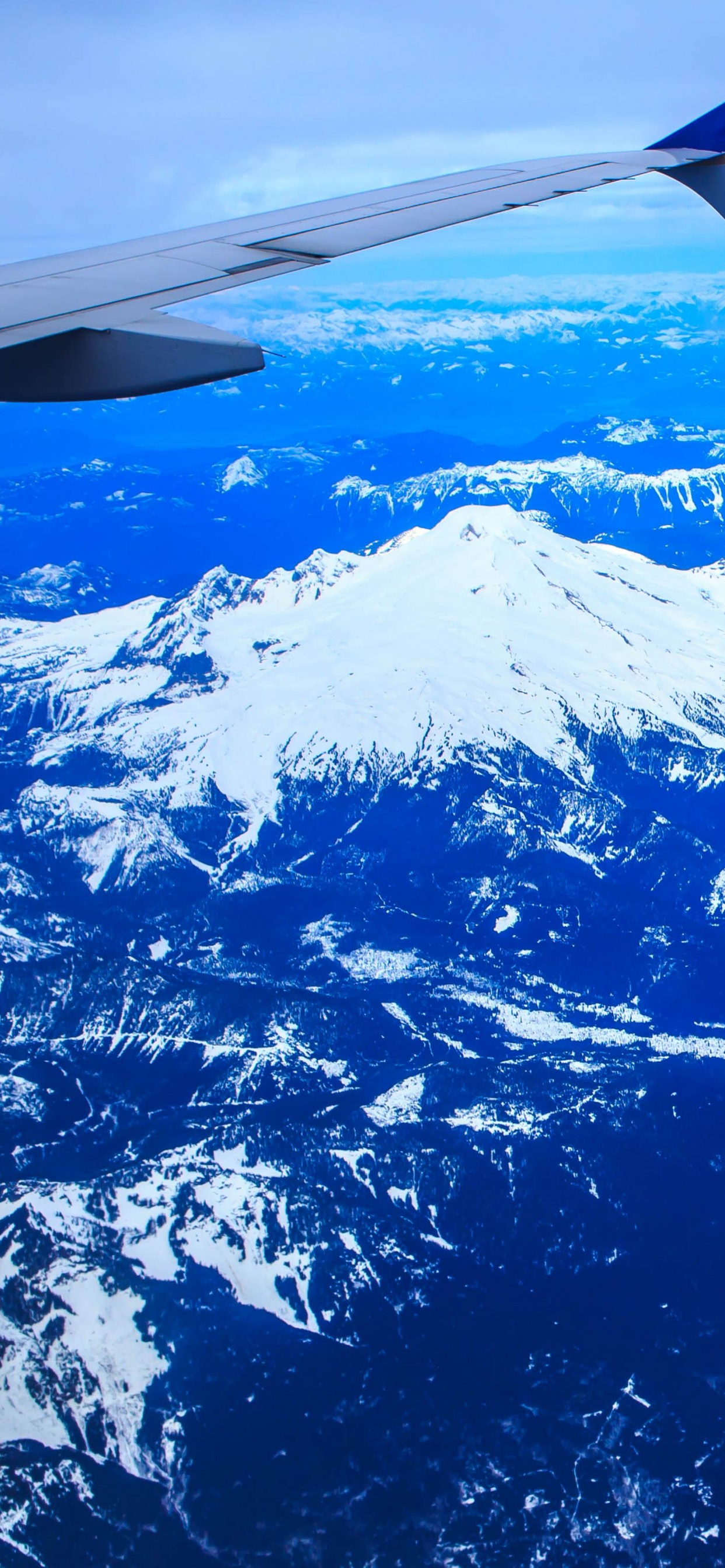 White Clouds Over Snow Covered Mountain During Daytime. Wallpaper in 1242x2688 Resolution