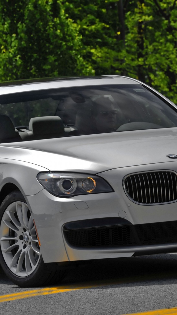 White Bmw m 3 Coupe Parked on Gray Asphalt Road During Daytime. Wallpaper in 720x1280 Resolution