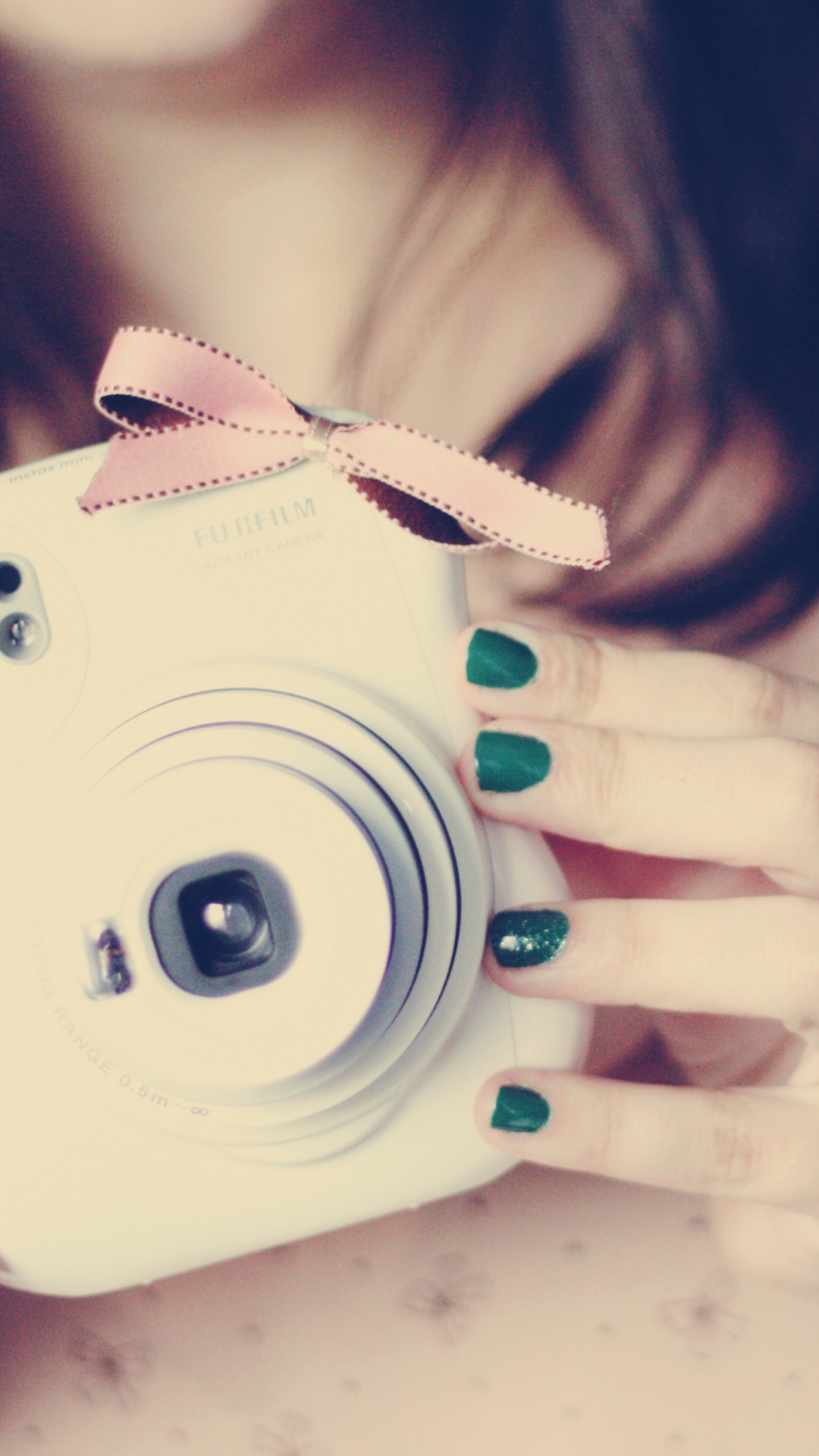 Woman Holding White Point and Shoot Camera. Wallpaper in 1080x1920 Resolution