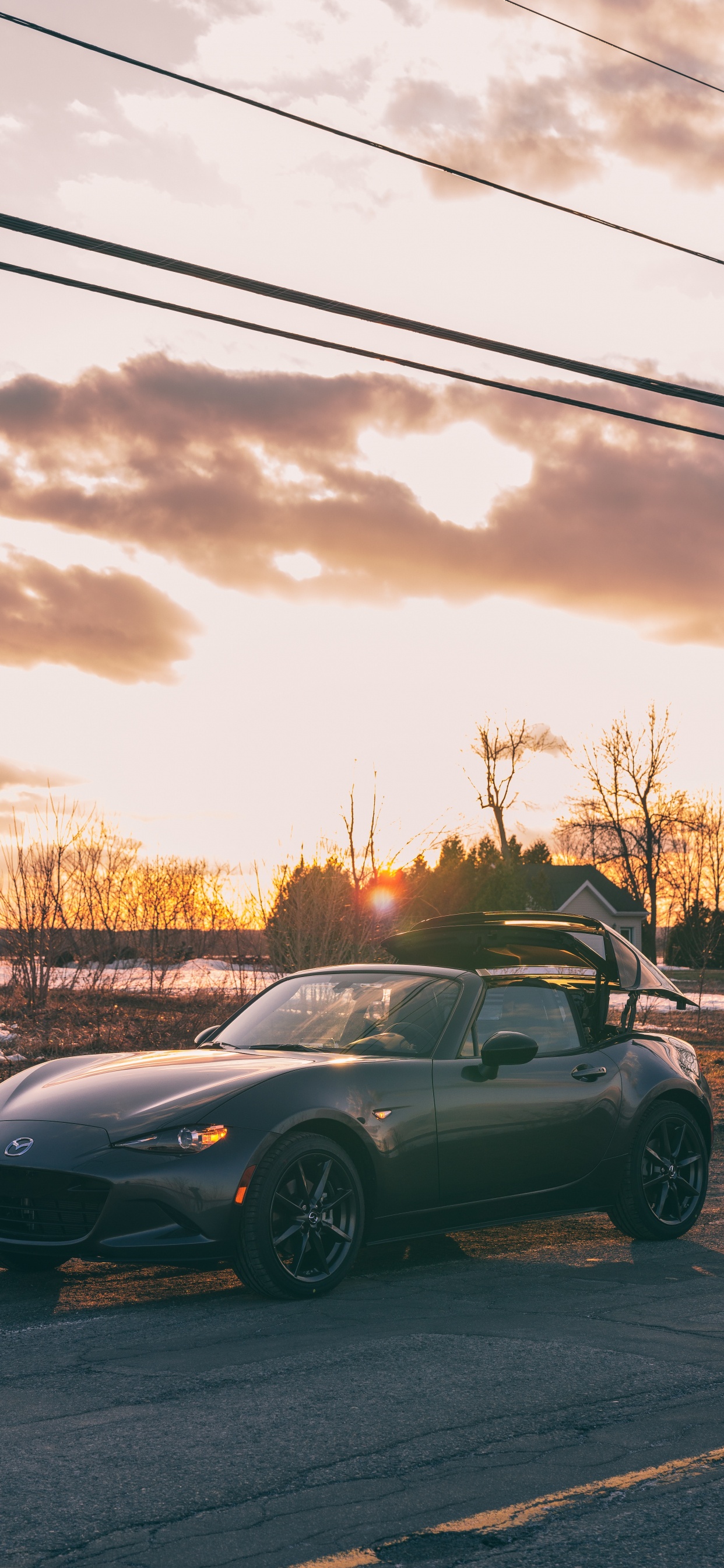 Black Coupe on Road During Daytime. Wallpaper in 1242x2688 Resolution