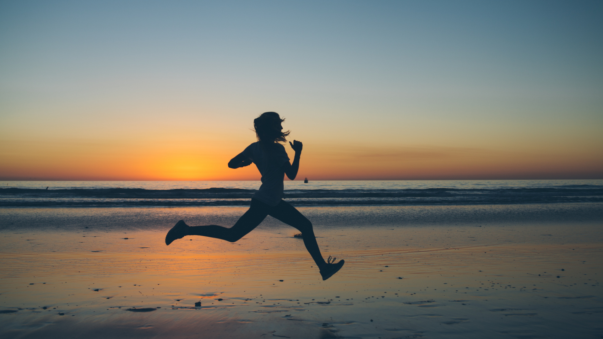 Silhouette of Man Jumping on Beach During Sunset. Wallpaper in 1920x1080 Resolution