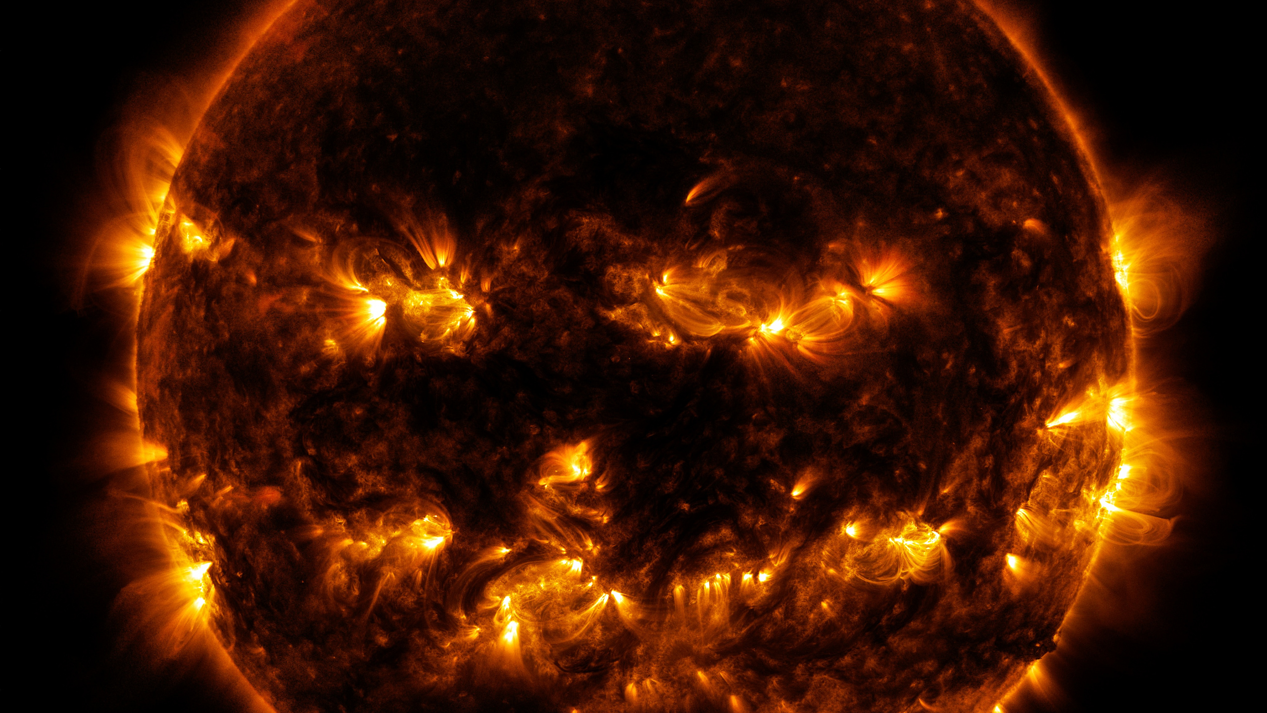 Gelber Und Schwarzer Planet Abbildung. Wallpaper in 2560x1440 Resolution