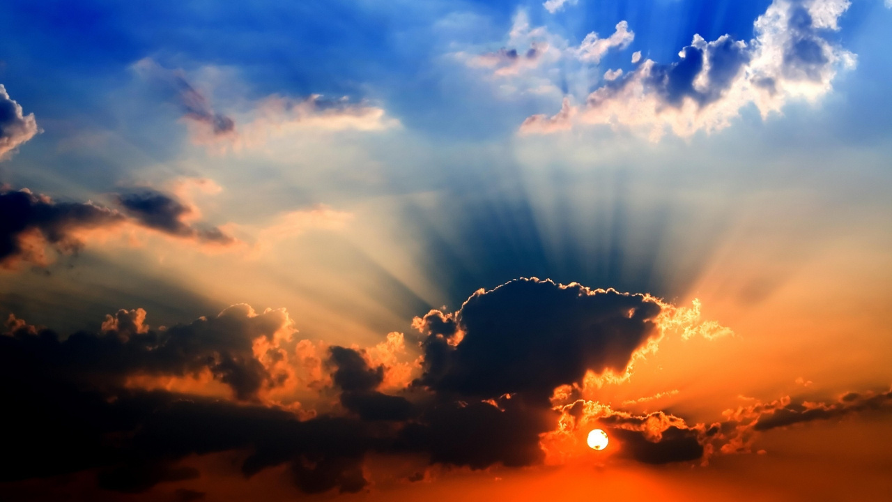 Nuages et Soleil au Coucher du Soleil. Wallpaper in 1280x720 Resolution