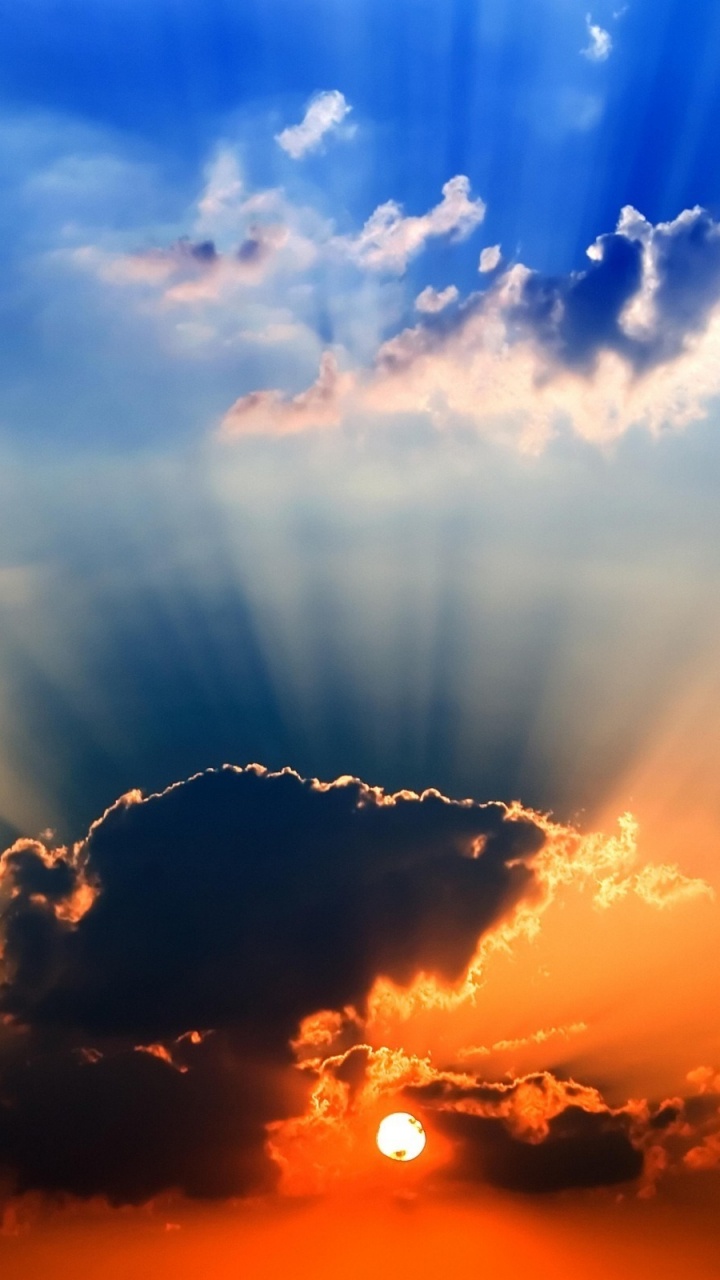 Nuages et Soleil au Coucher du Soleil. Wallpaper in 720x1280 Resolution