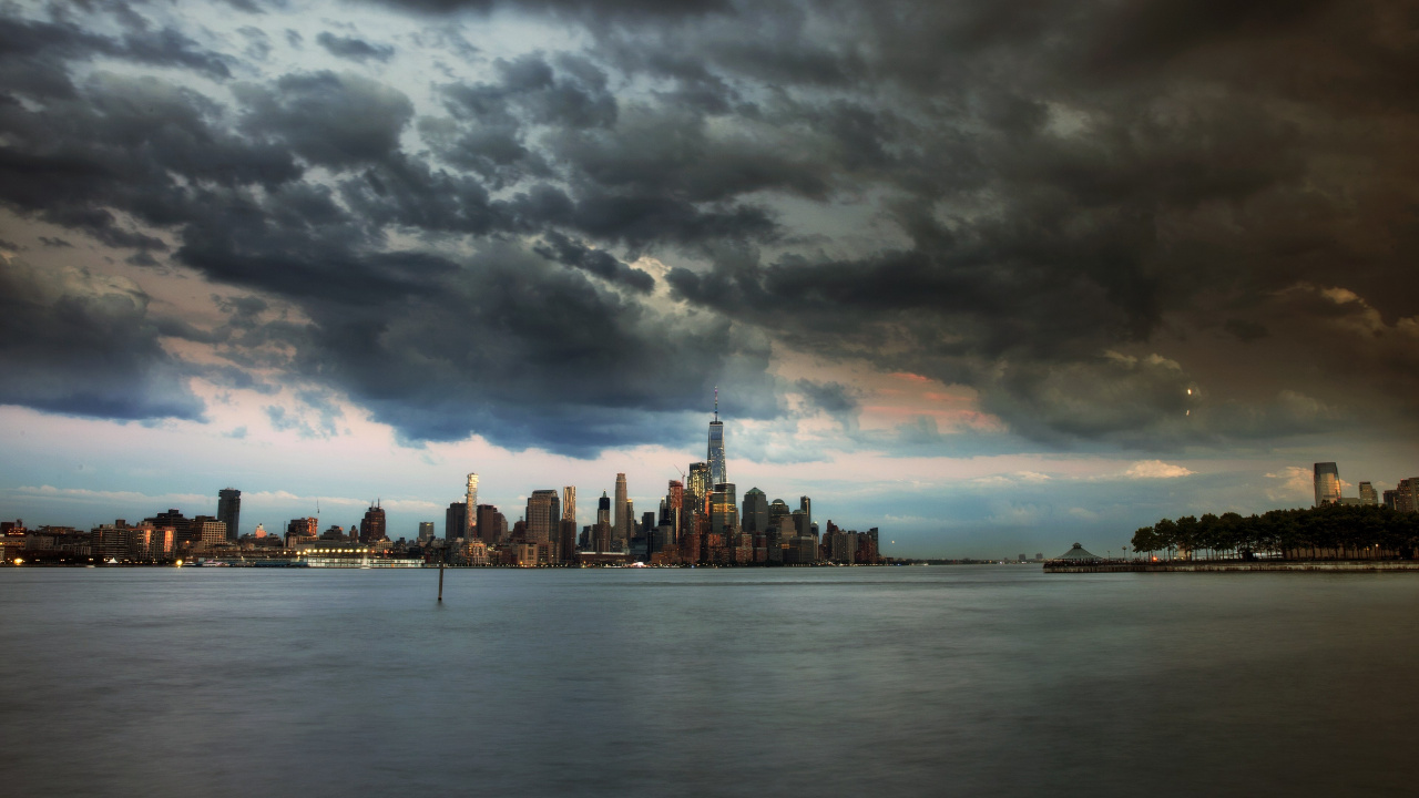 City Skyline Under Cloudy Sky During Daytime. Wallpaper in 1280x720 Resolution