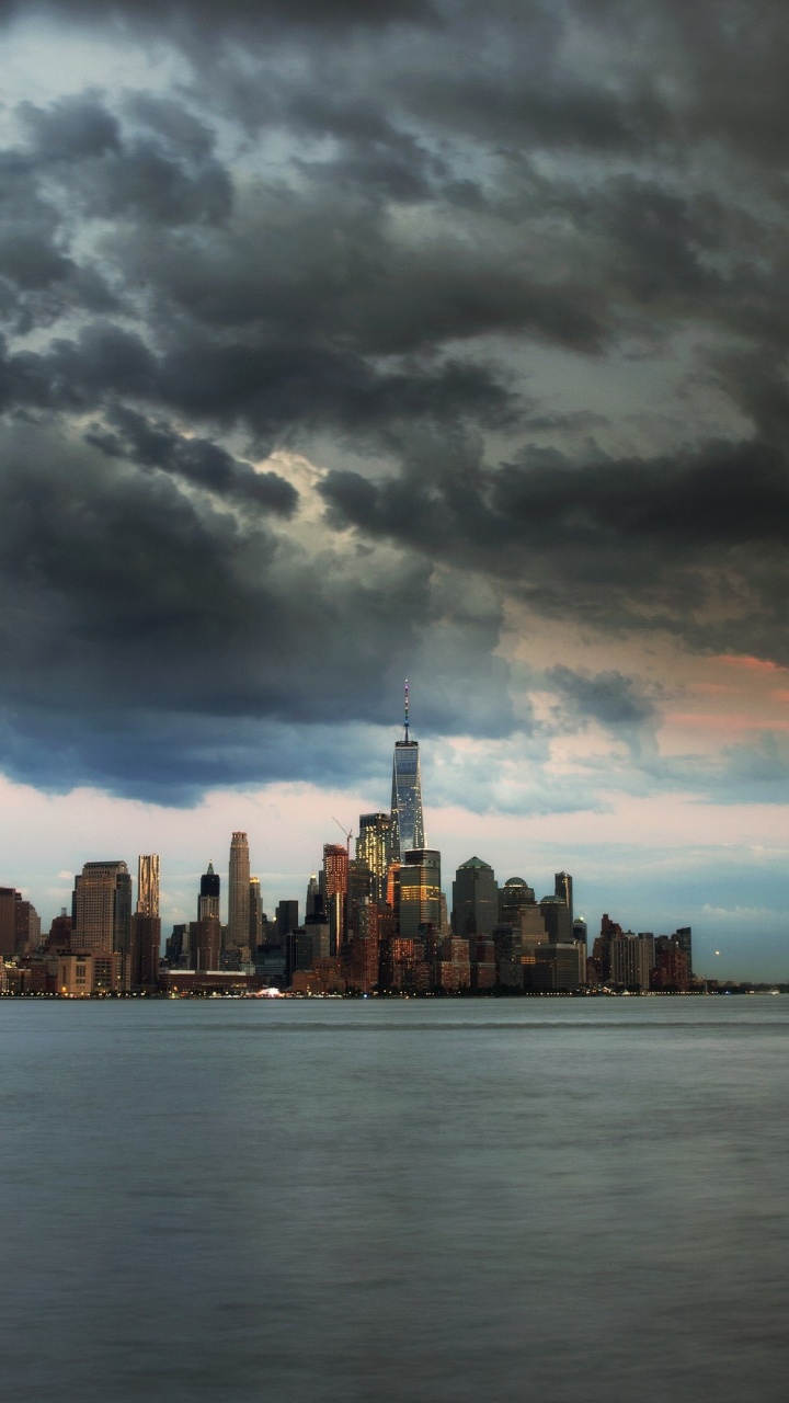 City Skyline Under Cloudy Sky During Daytime. Wallpaper in 720x1280 Resolution