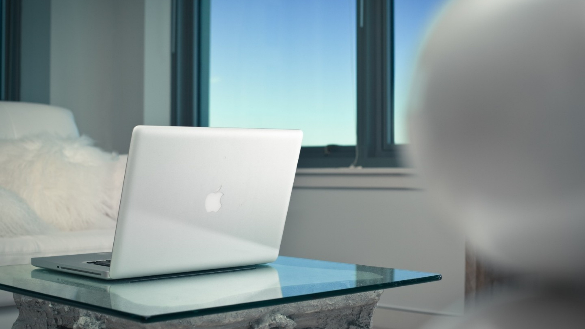 Silver Macbook on Blue Table. Wallpaper in 1920x1080 Resolution