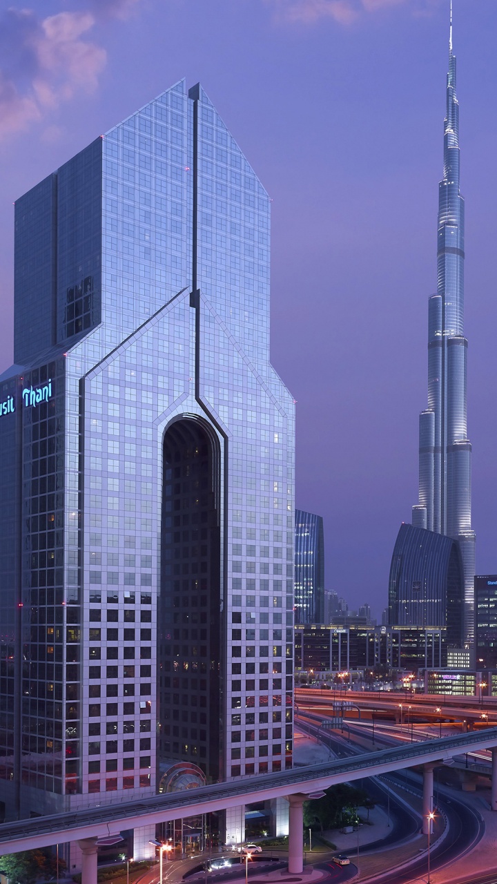 Time Lapse Photography of City Buildings During Night Time. Wallpaper in 720x1280 Resolution